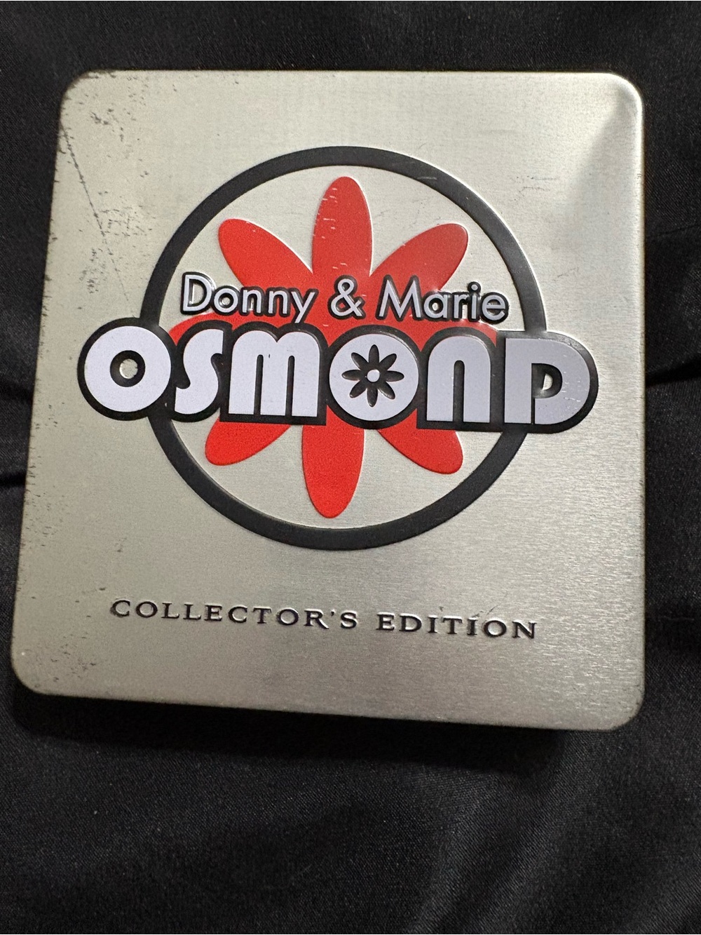 Donny & Marie Osmond Collector's Edition tin featuring a 3-disc audio CD set